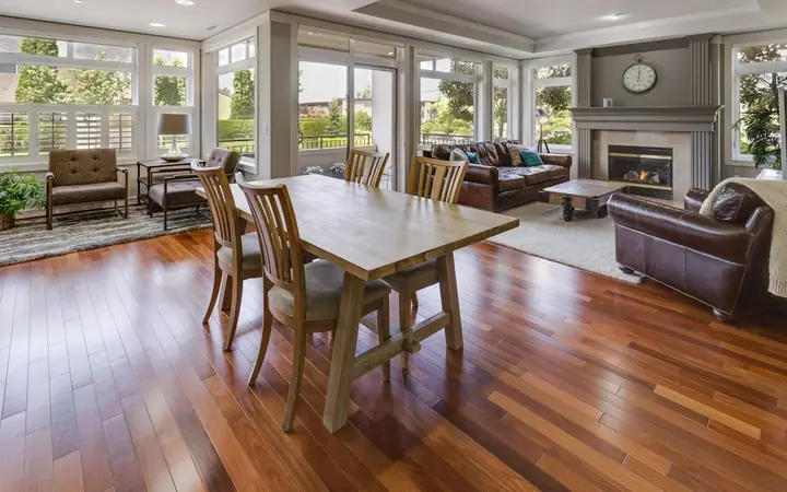 Living and dining room with warm hardwood floors