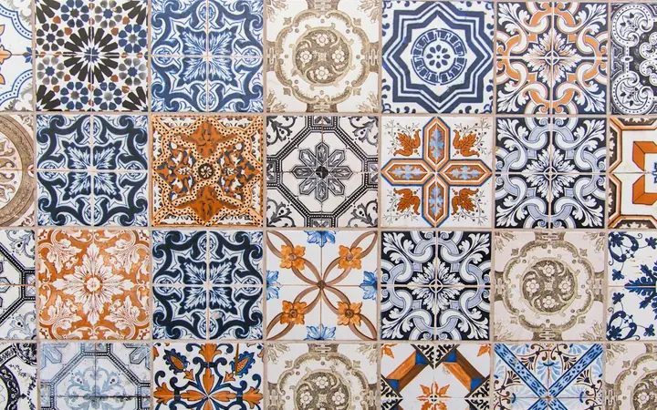 Patterned blue and orange encaustic floor tiles