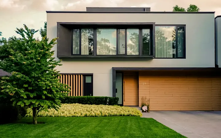 Modern two-storey house with a smooth stucco facade