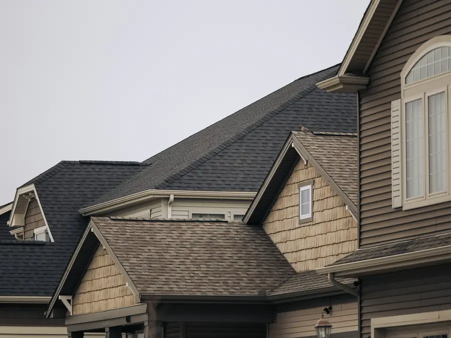 Row of houses with new shingle roofs